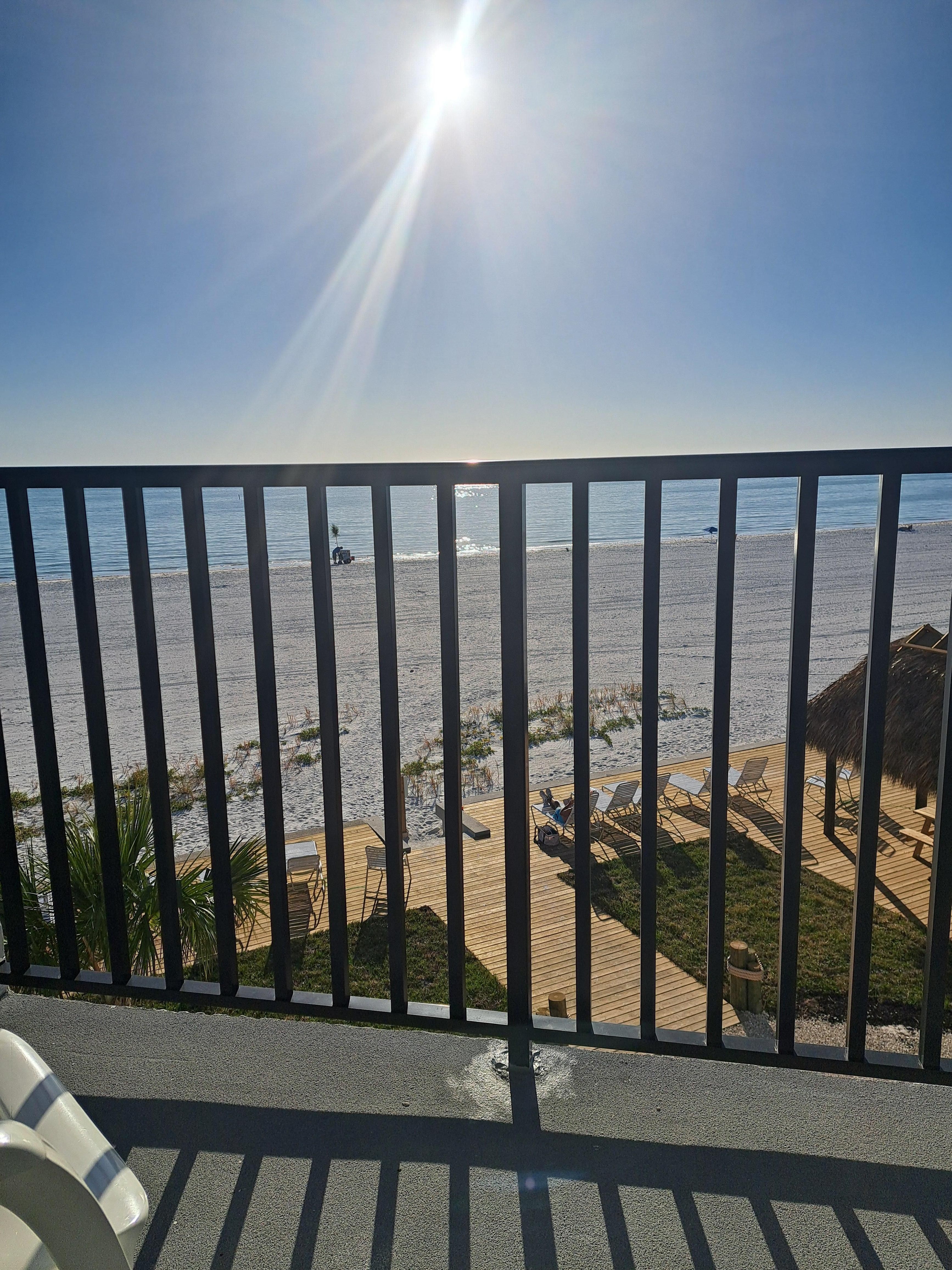 Our view off the living room balcony where we had coffee in the morning and a cocktail after tanning all day