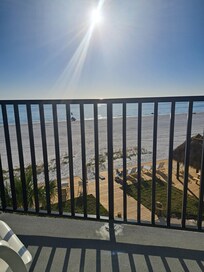 Our view off the living room balcony where we had coffee in the morning and a cocktail after tanning all day