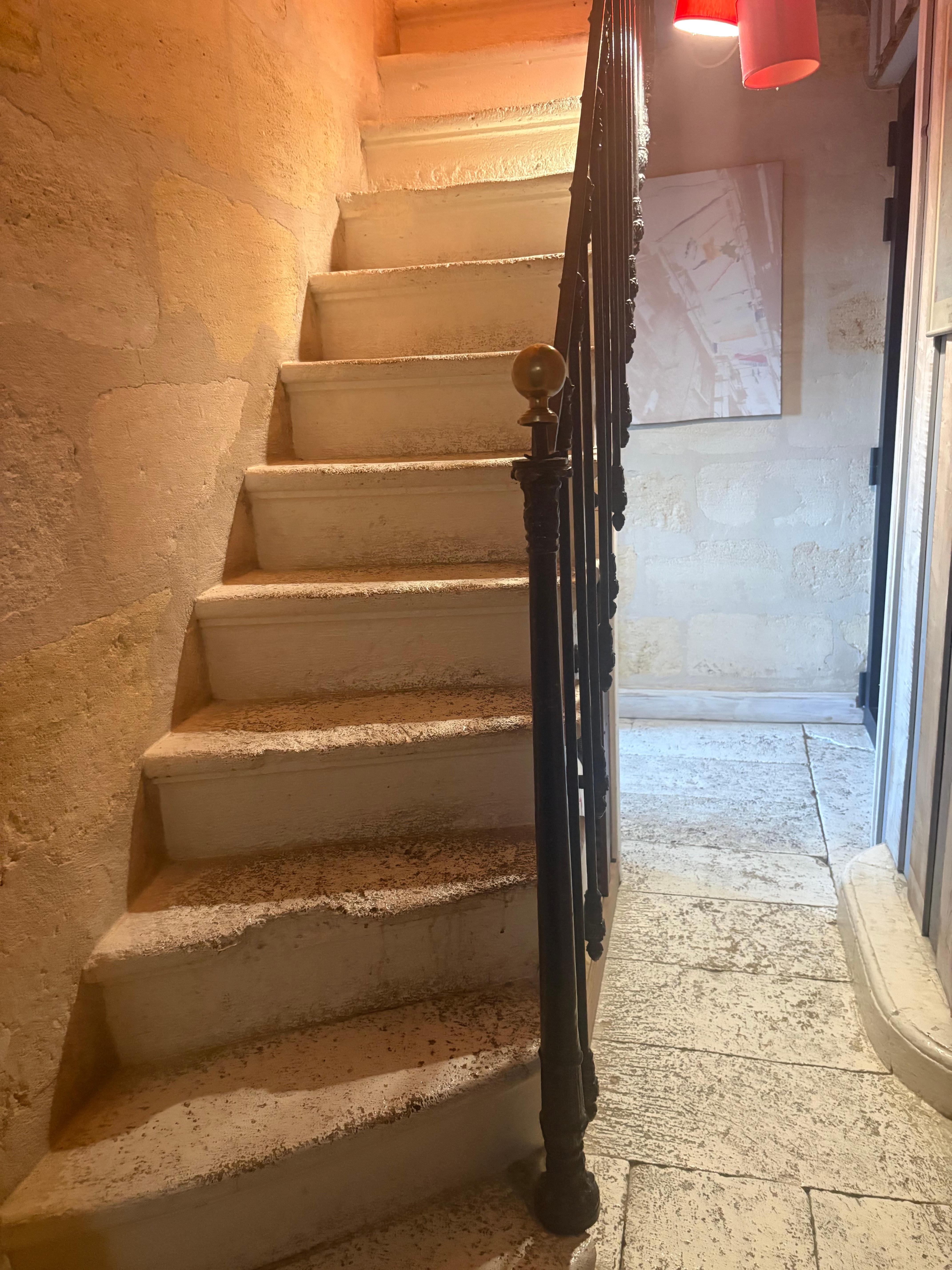 Narrow staircase to attic bedrooms. Wobbly handrail was poorly connected 