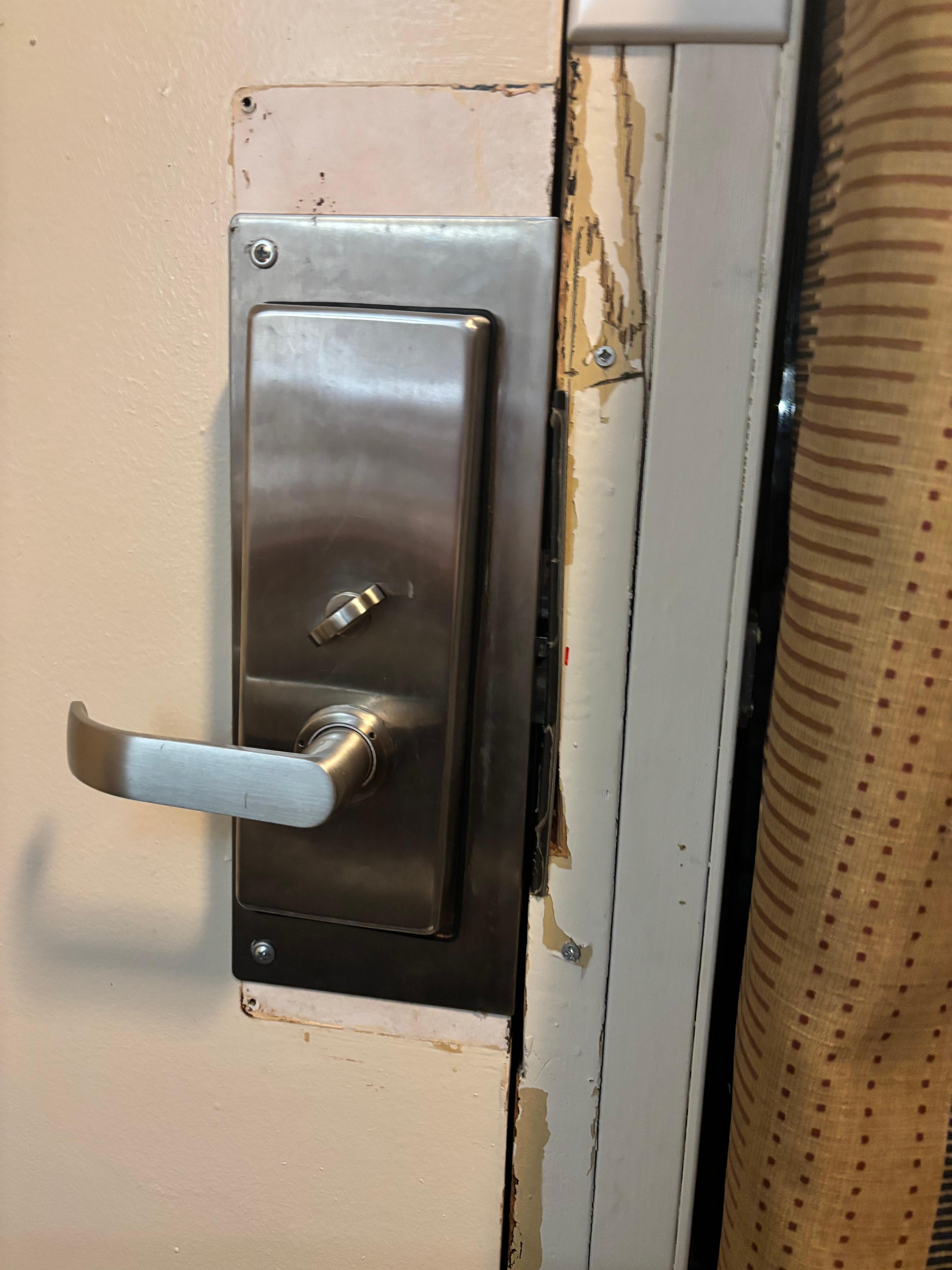 Door that didn’t shut that has obviously been kicked in by police