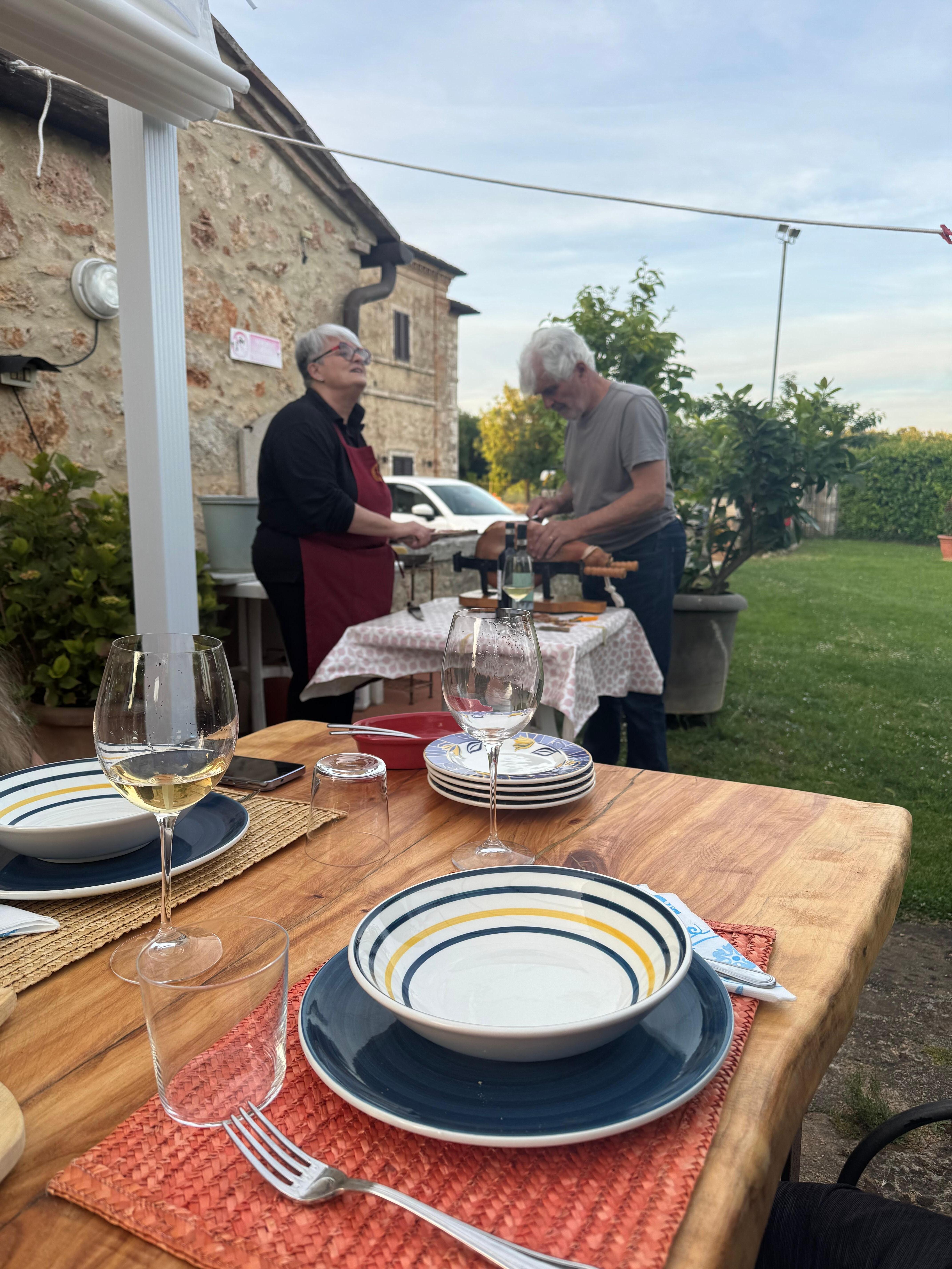 Our fantastic hosts preparing part of the amazing meal