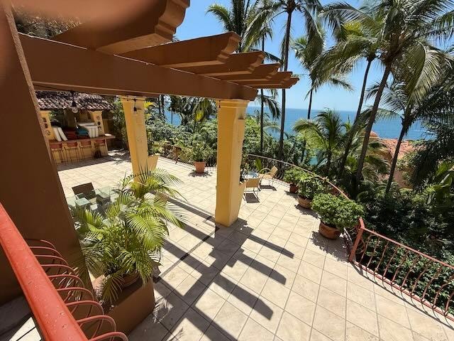 Standing on steps down to second level