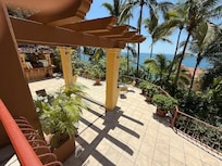 Standing on steps down to second level