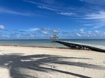 The dock on the beach at the resort.