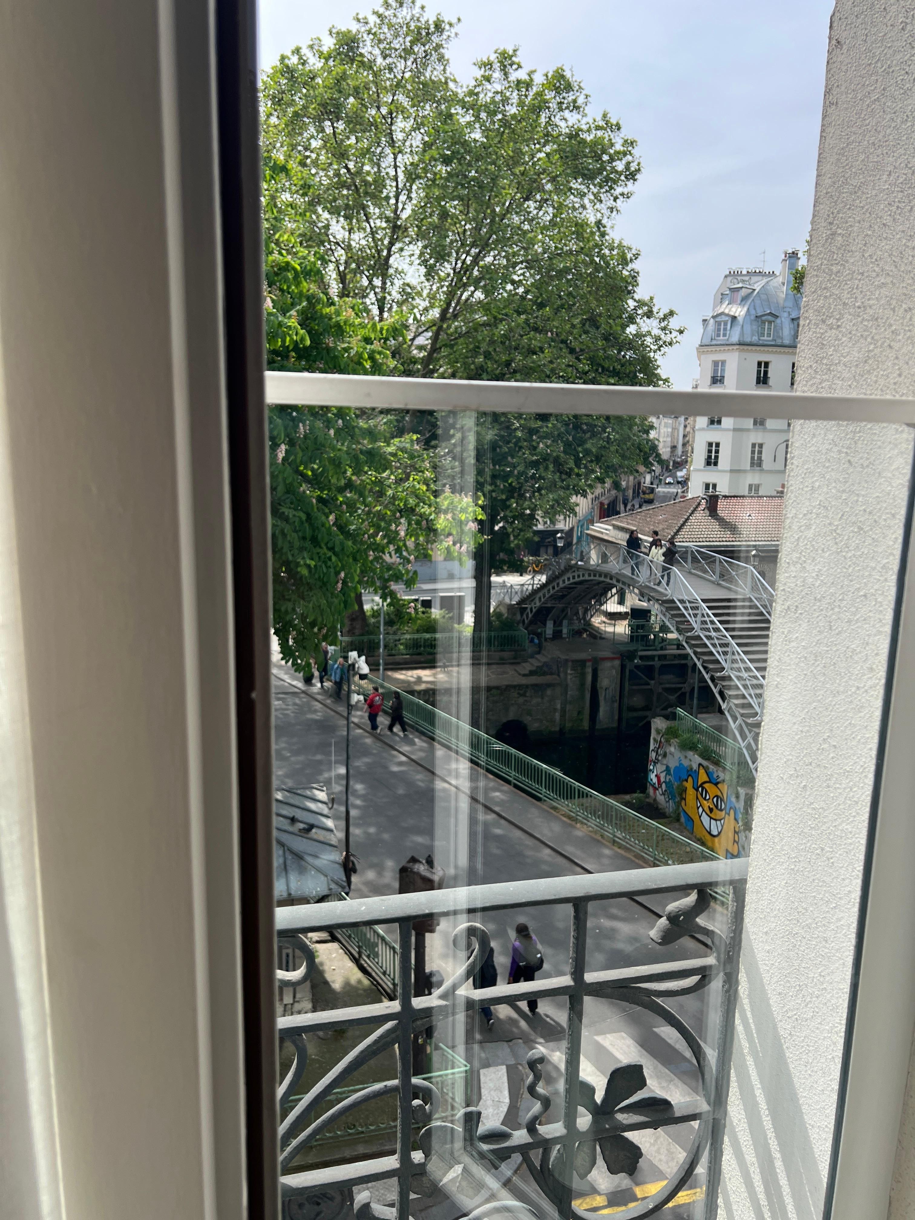 View from our room of the lock and swing bridge on Canal Saint-Martin