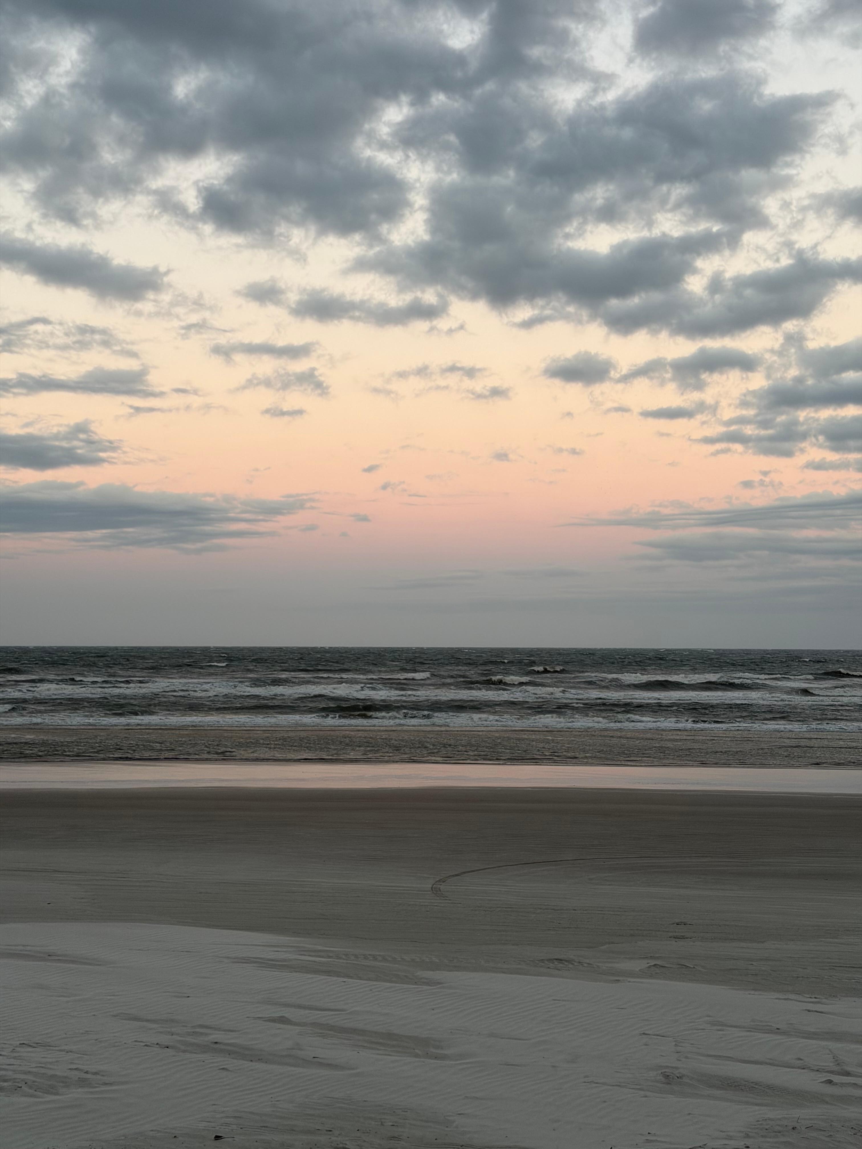 The beach reflection of sunset - looking east while sun setting behind me