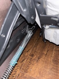 Mechanism that allows the bed to pull out and fold up. one side was bent and the other side was missing an arm and the bed assembly moved sideways when trying to close and would jam.