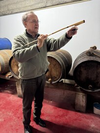 Wine sampling from owner's casks.