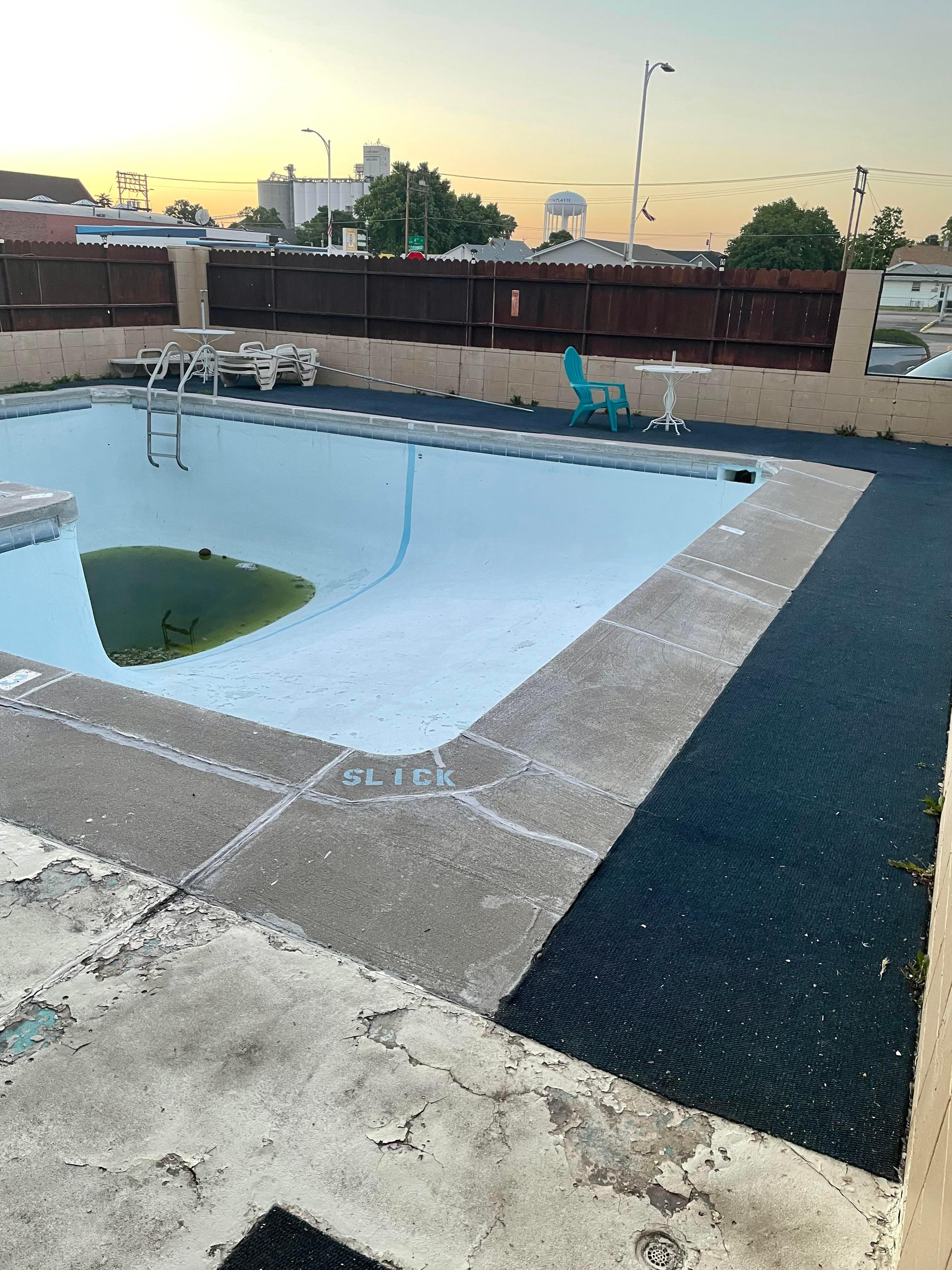 This is the pool as of 6/21/25.  Unopen, not clean, filled with green dirty water--completely unlike the picture posted on Expedia website.