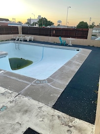 This is the pool as of 6/21/25. Unopen, not clean, filled with green dirty water--completely unlike the picture posted on Expedia website.