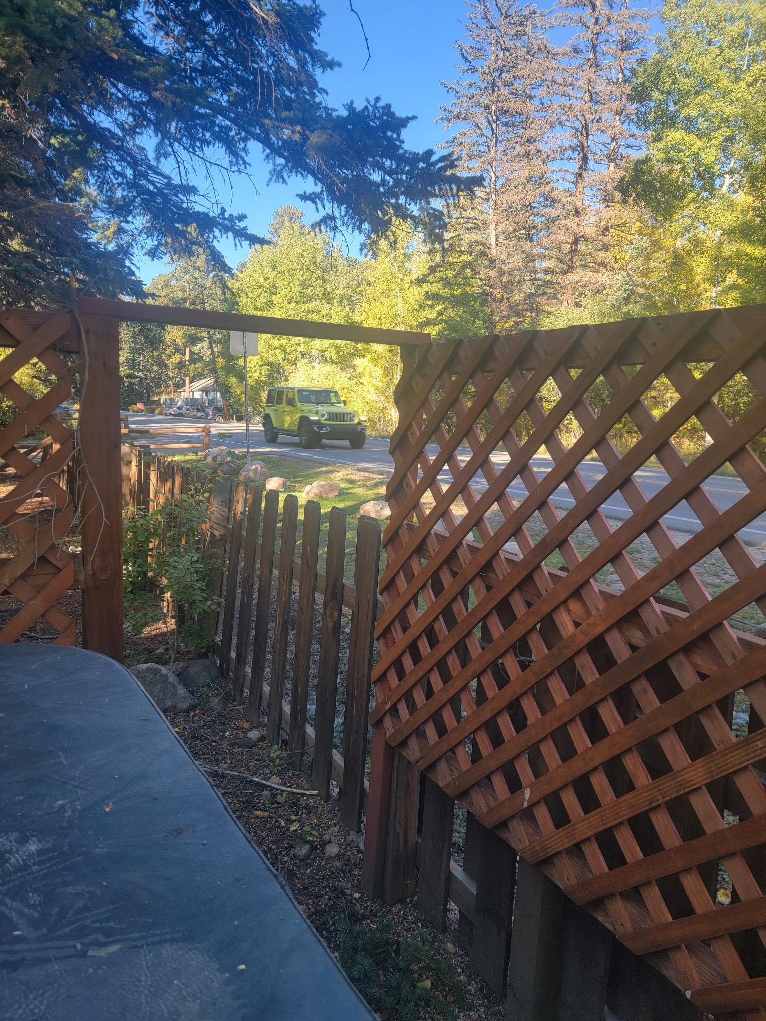 Edge of hot-tub with vehicle going by. Felt like you were piratically sitting on highway. Absolutely no privacy.