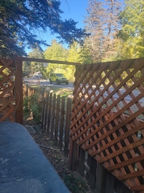 Edge of hot-tub with vehicle going by. Felt like you were piratically sitting on highway. Absolutely no privacy.