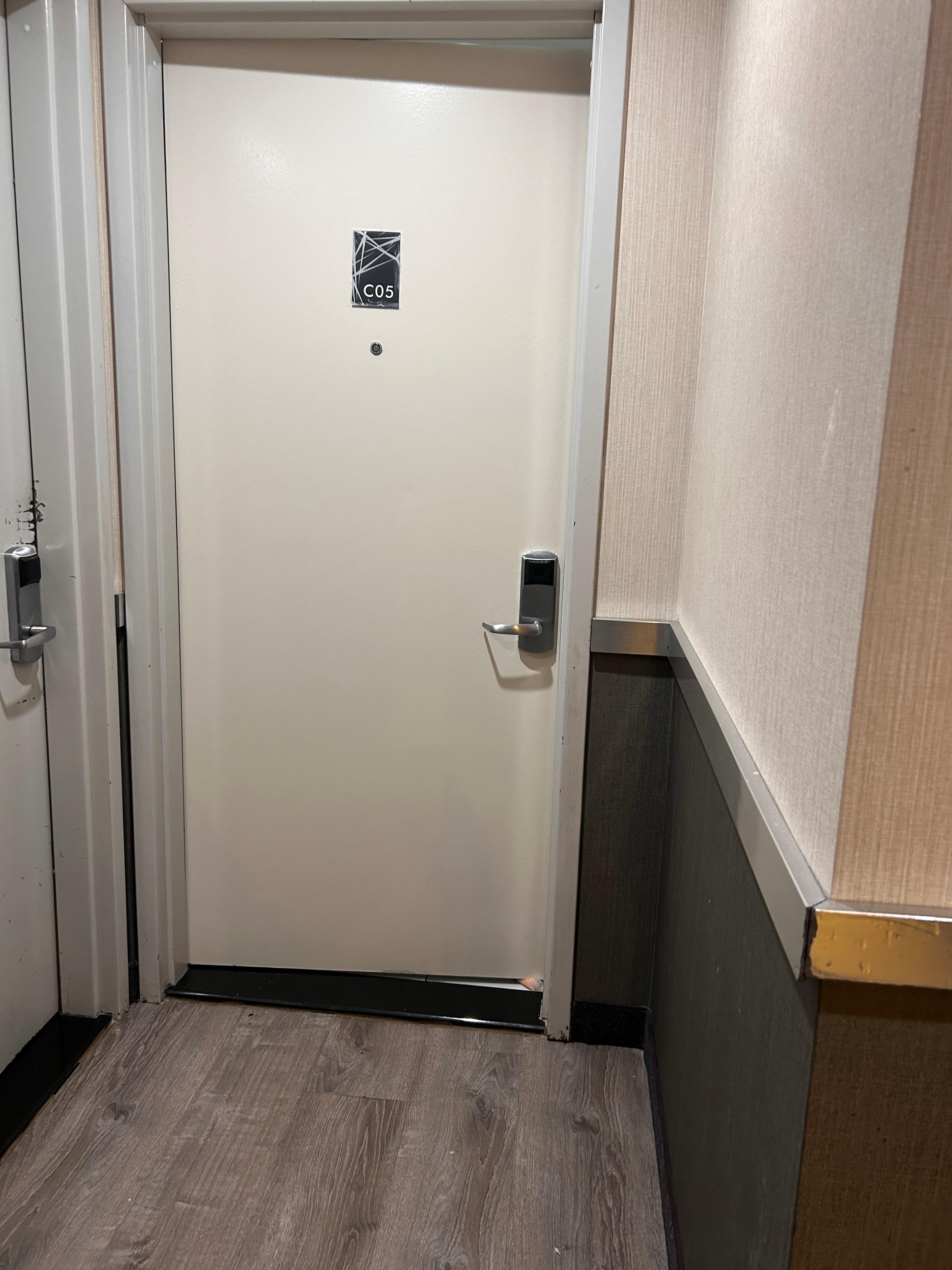 the opened room upon arrival with the shampoo bottle 