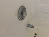 Bathtub facet. Hard to turn on and off. No water pressure