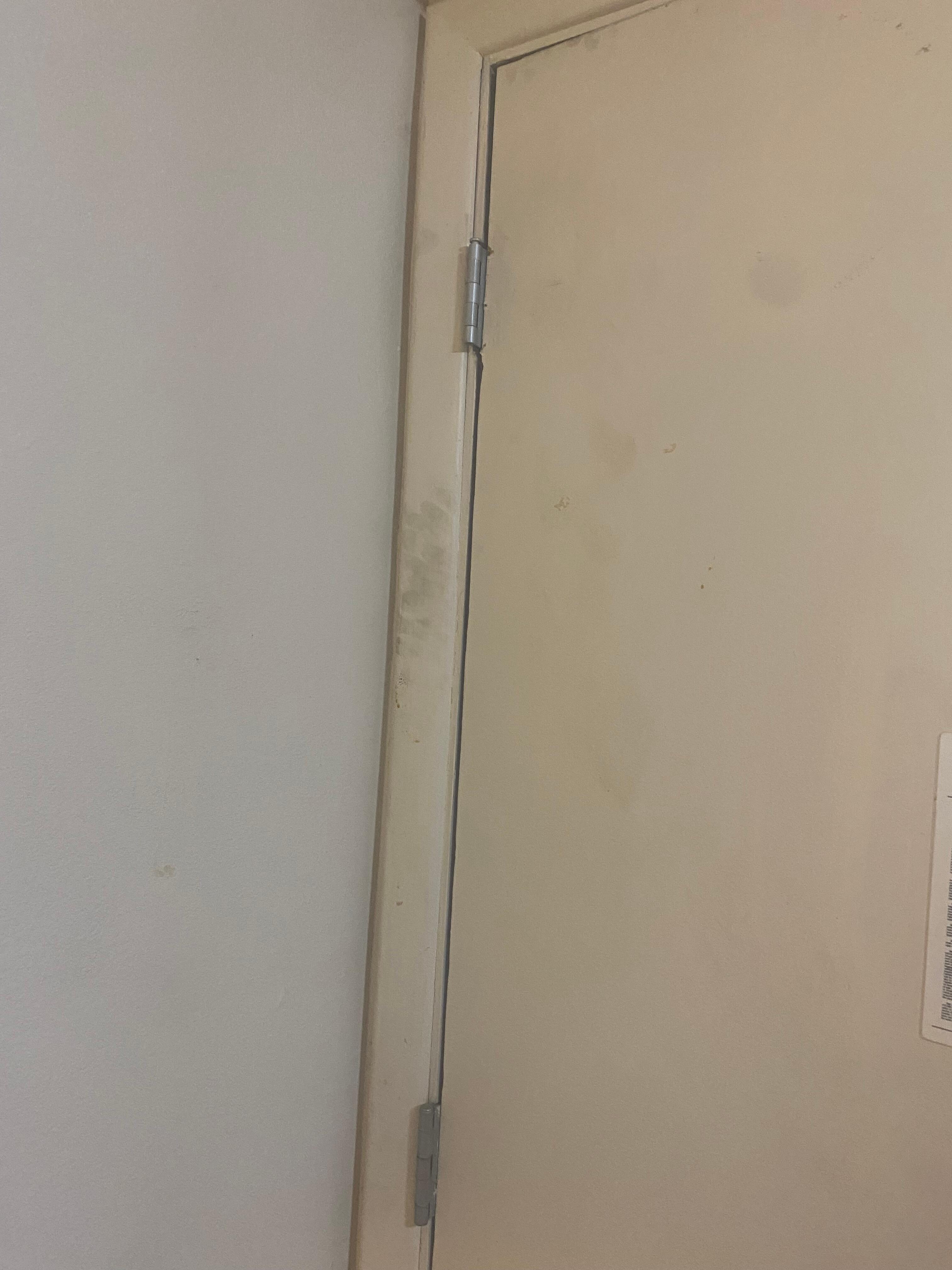 Dirty handprints all over door