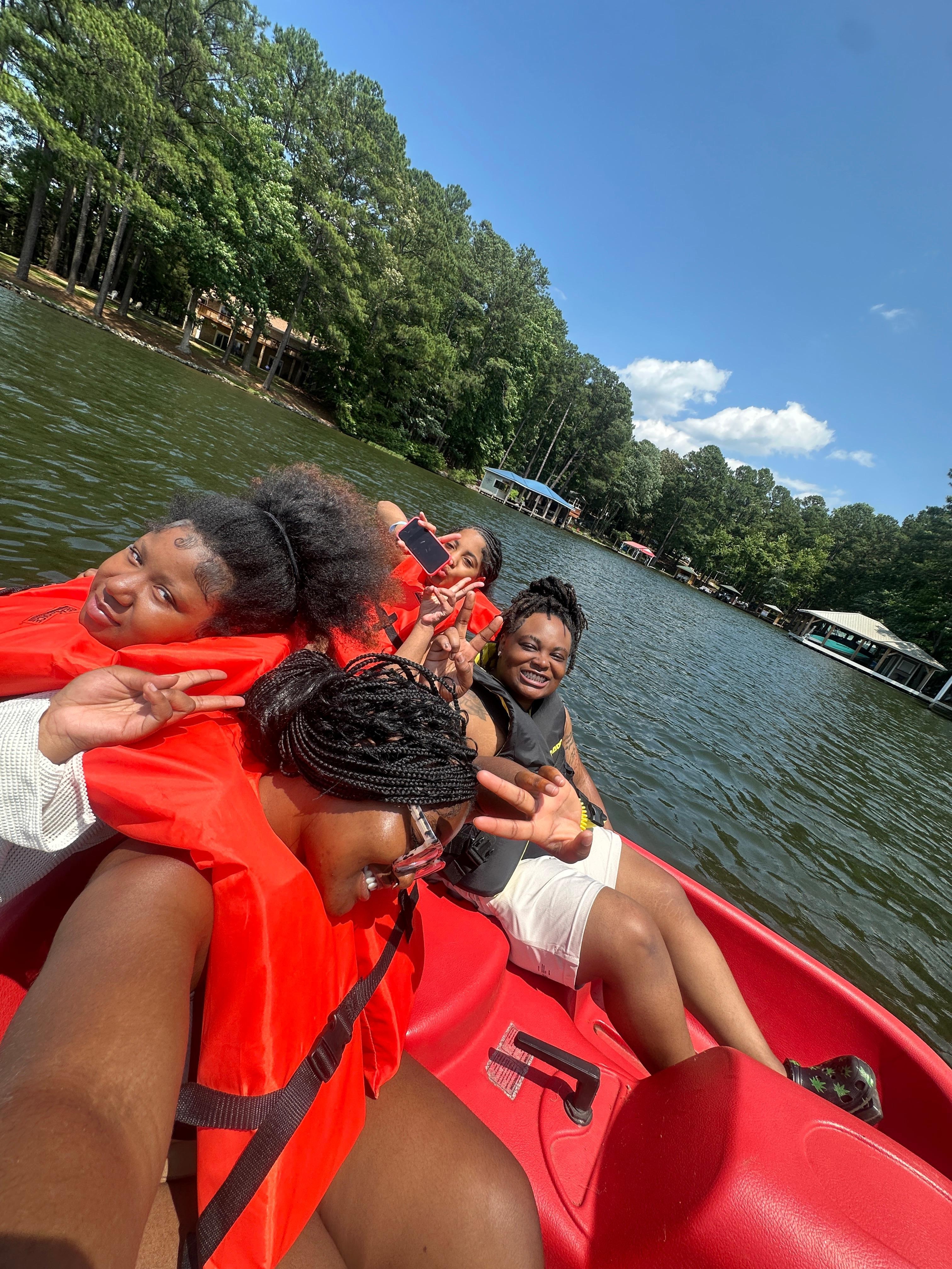 The girls enjoyed the provided paddle boat