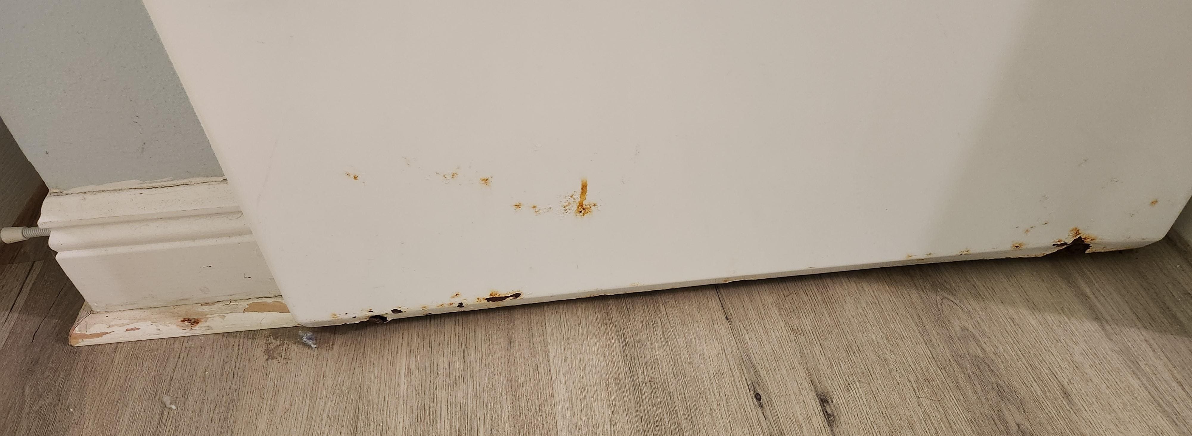 Rust and rotting wood.