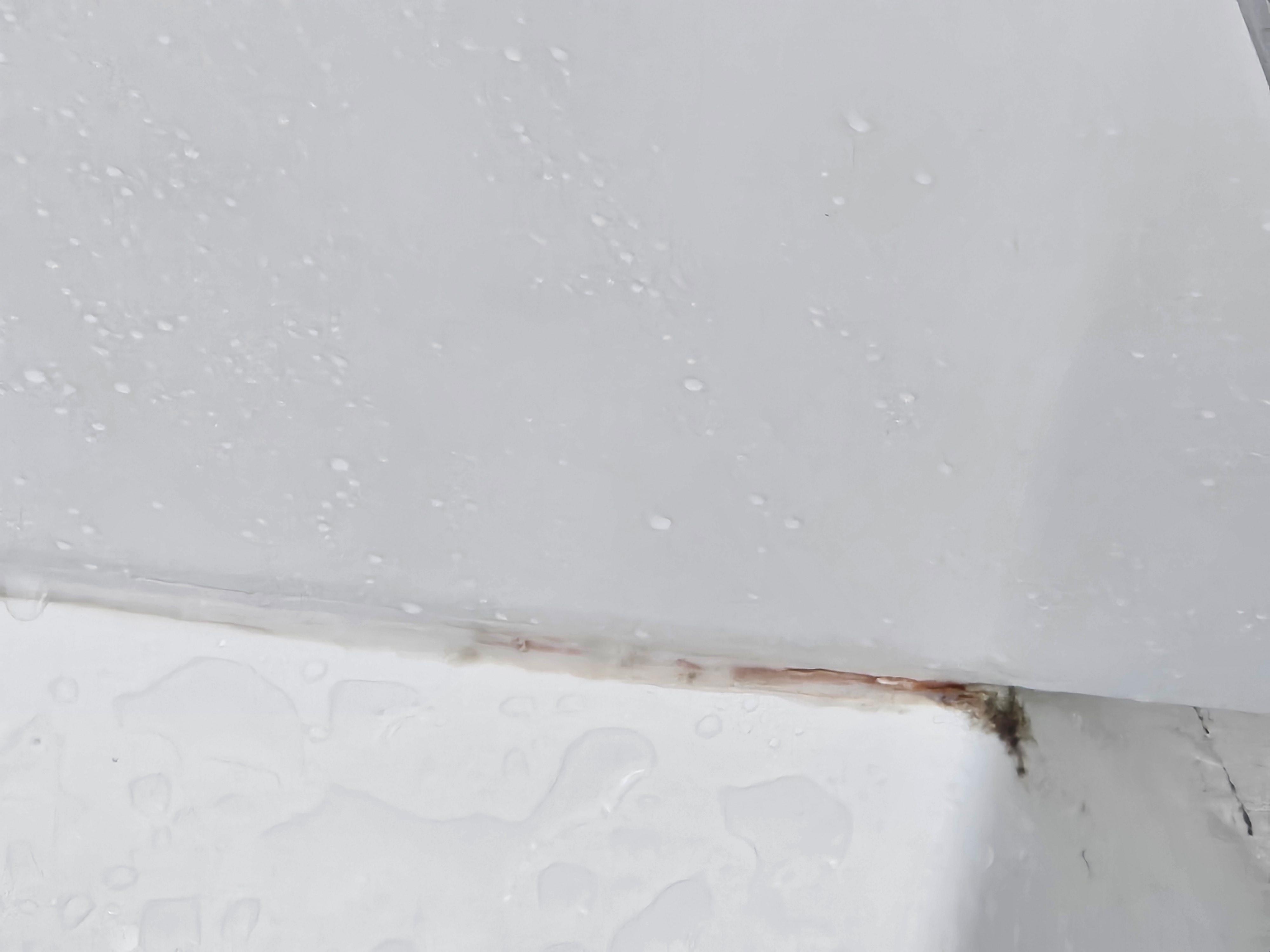 This one is up front near the outside edge of the tub.