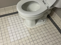 Broken tiles, toilet lopsided