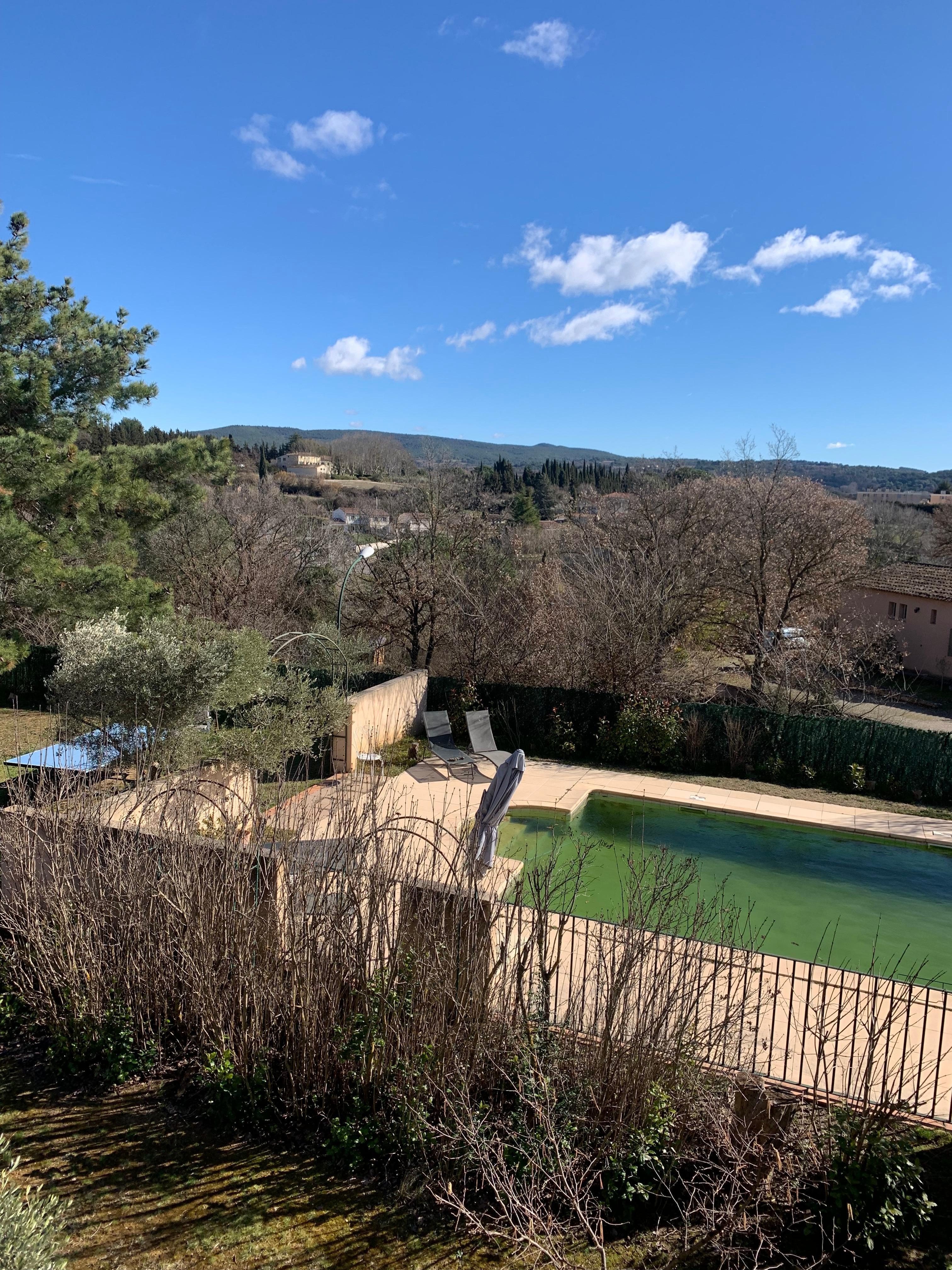 View from upstairs bedroom over the pool. 