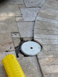 Pool deck has several broken tiles with sharp edge. Very unsafe