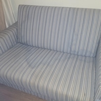 Badly stained sofa
