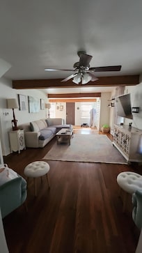 Open living room looking into kitchen