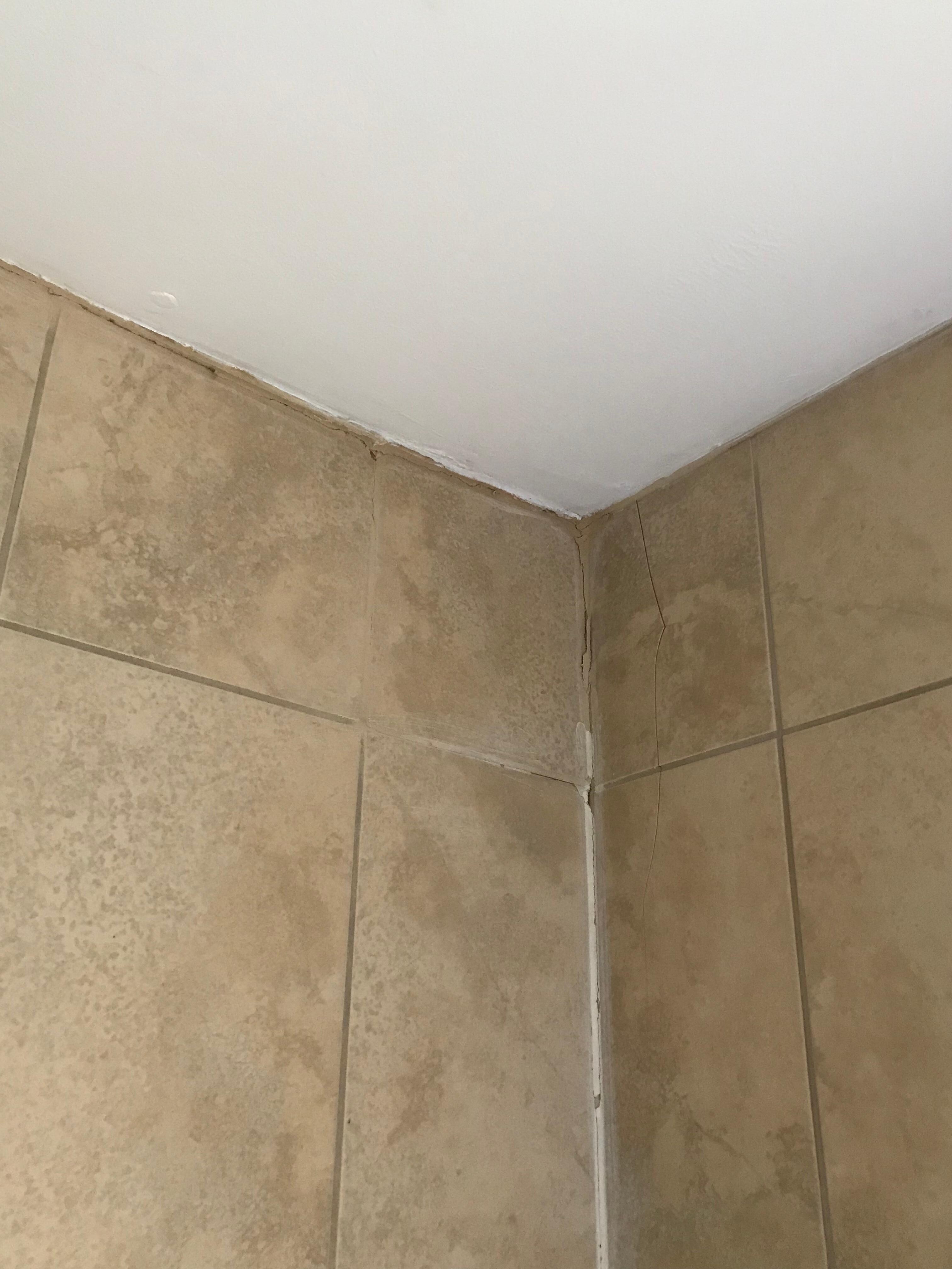 Large crack in tiling in bathroom