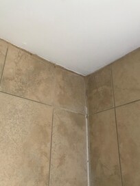Large crack in tiling in bathroom
