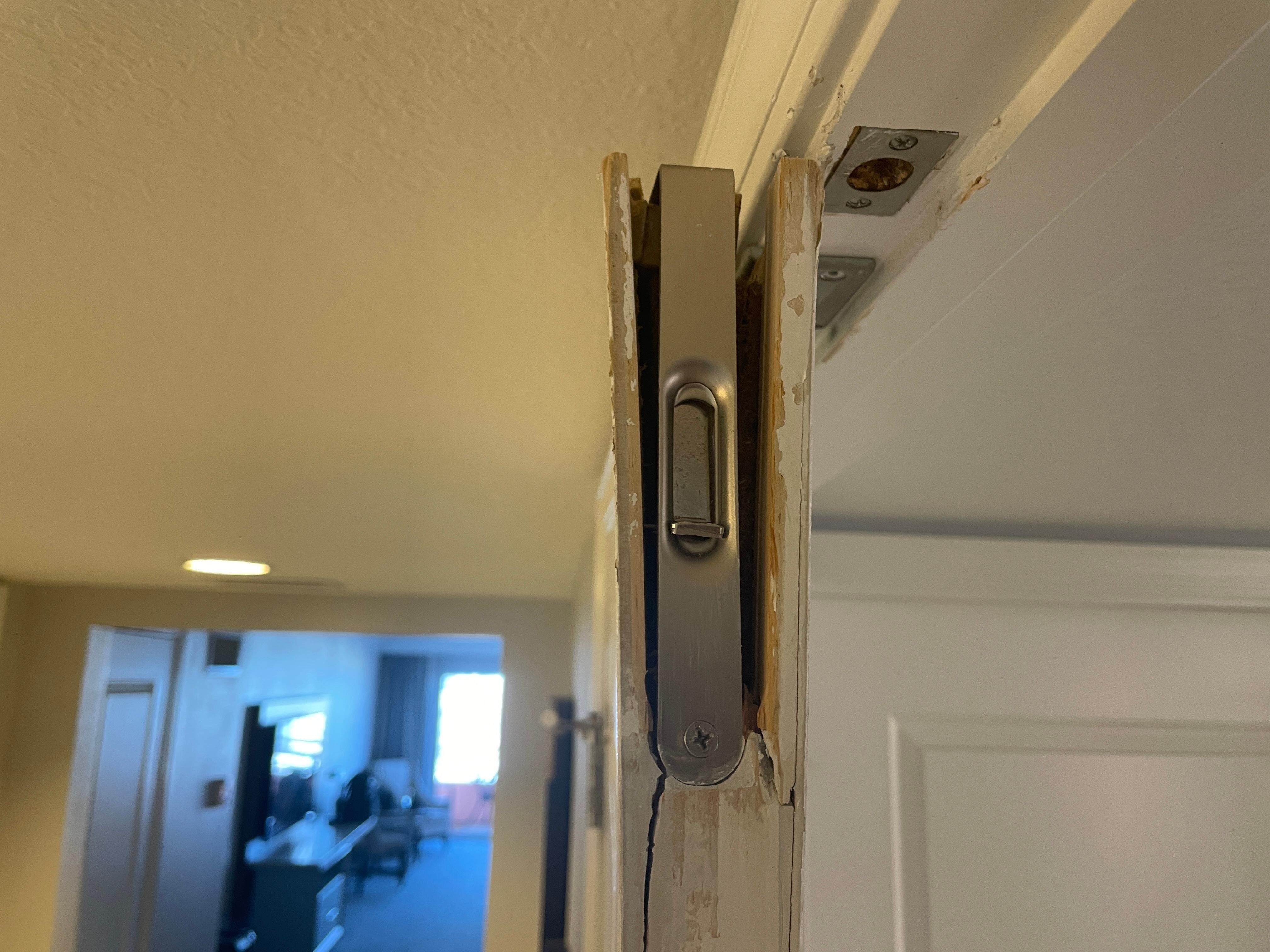 Bathroom door wouldnât close and was busted in several spots and handle was missing!