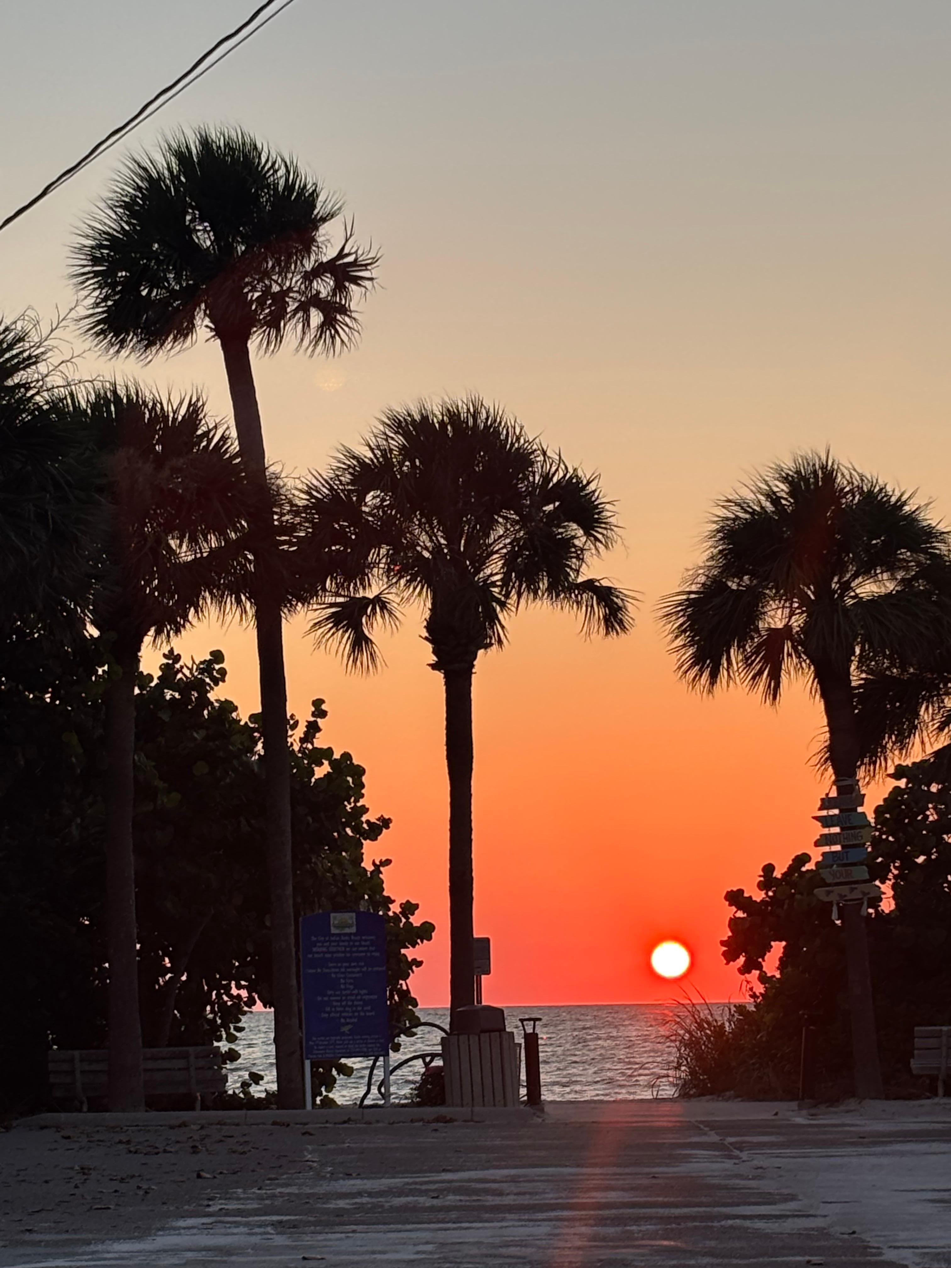 Sunset view from beach access drive in front of apartment. 