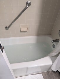 Water clogged in tub from turning the shower on.