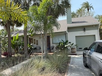 Front yard is spacious with parking