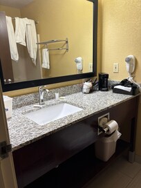 Might be able to see the holder hinge hanging out on left sude