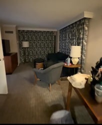 Spacious room! Couch pulls out, and there is a kitchenette.