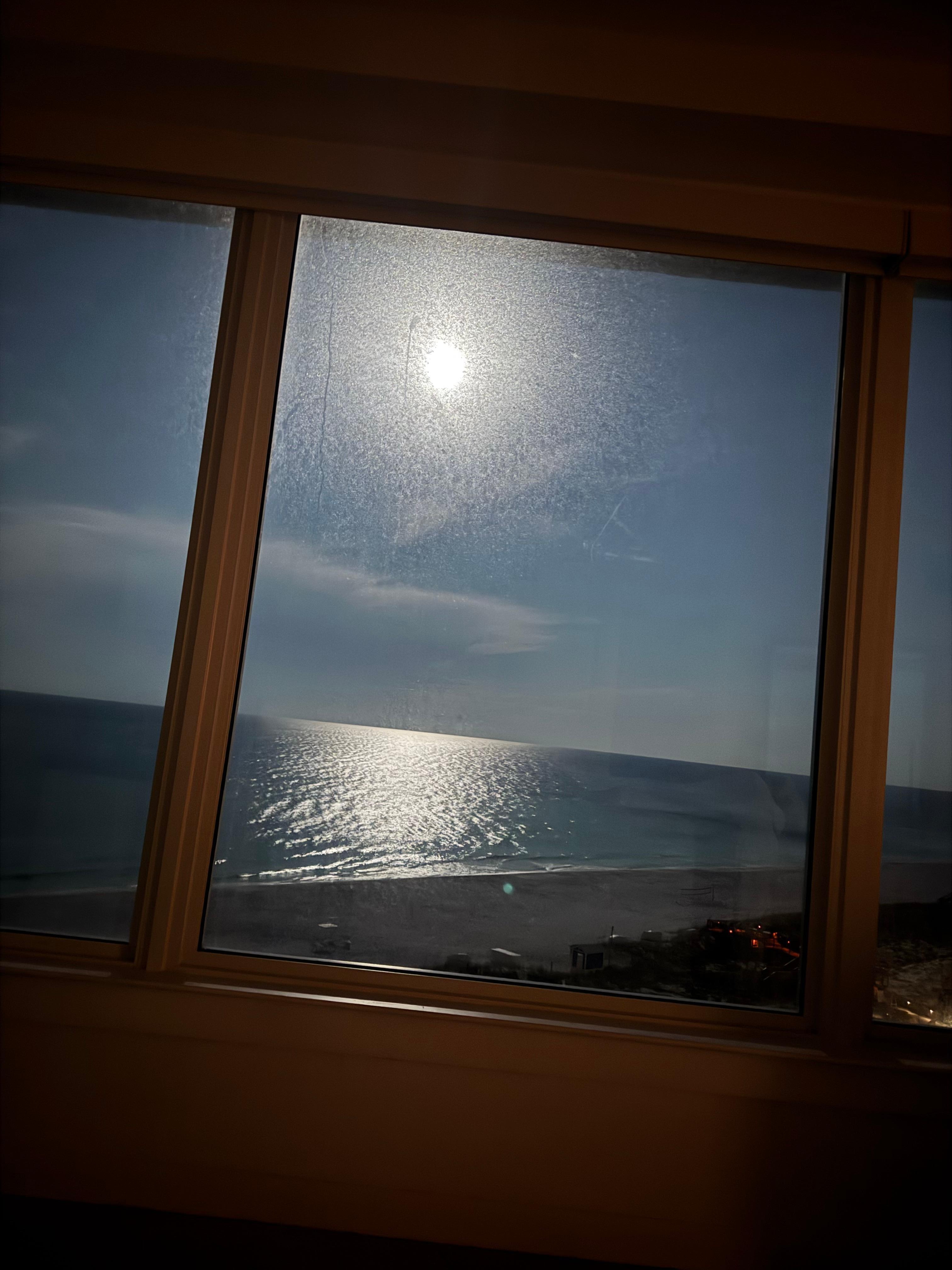 Full moon at 4am out of the primary bedroom window. 