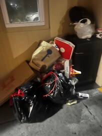 Here’s the pile of trash when I walked in to go to my room. This is unacceptable. It looks like a trap.