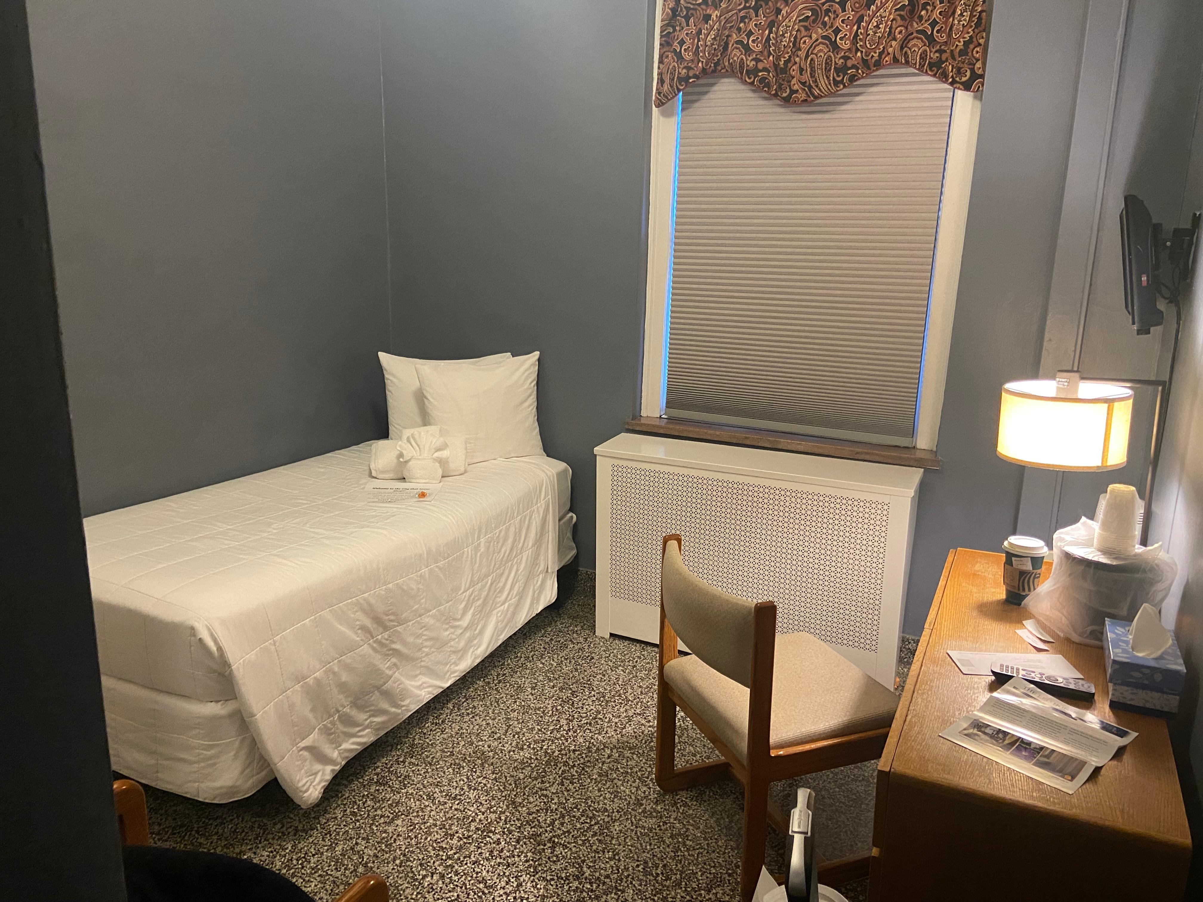 A picture of the room I stayed in, a single bed with a private bath. 