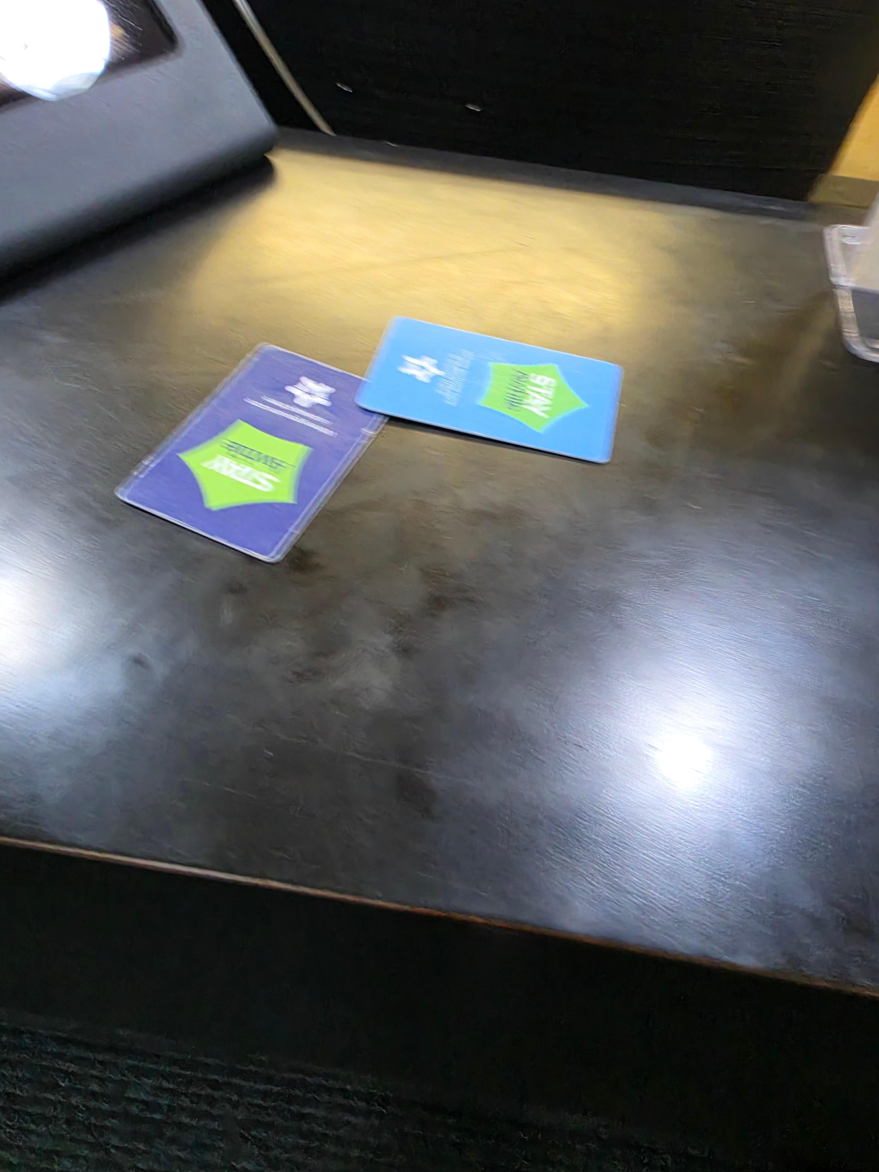 This is my door cards, no one at desk. I wanted to stay another day bc of fall, but desk man was rude, tacking more charges including my service animal. No automatic doors for seniors, no help. I am 75.
