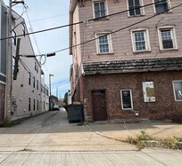 One building down on the street
