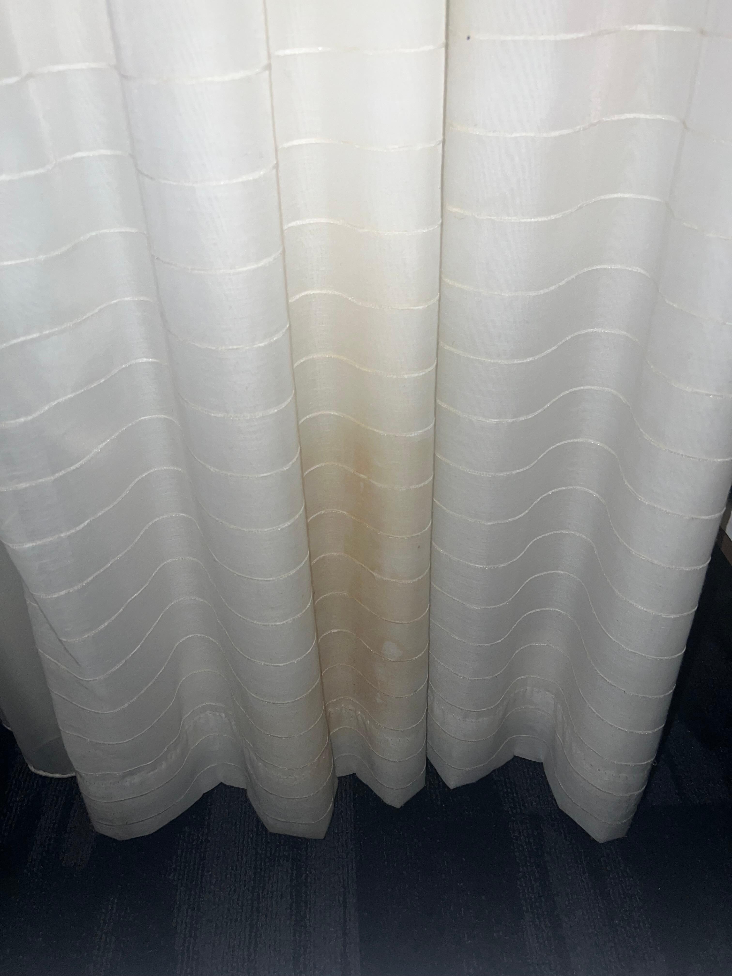 The big stain on the curtains 
