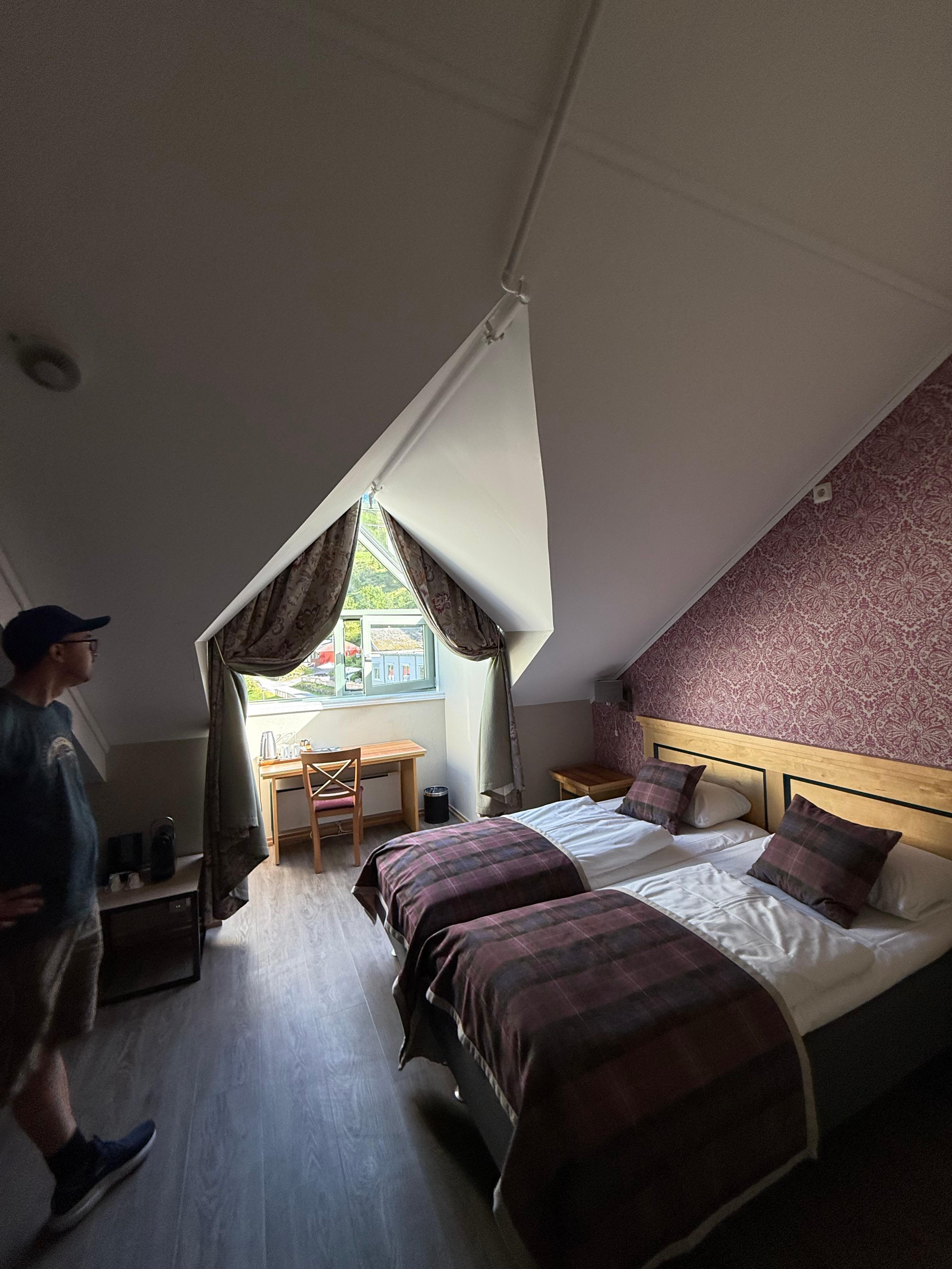 Half of the family room. Another full bed in another large space around the corner.