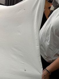 That blanket has two holes