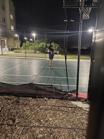 They have a pool and a Jacuzzi across that is the basketball court and golf game