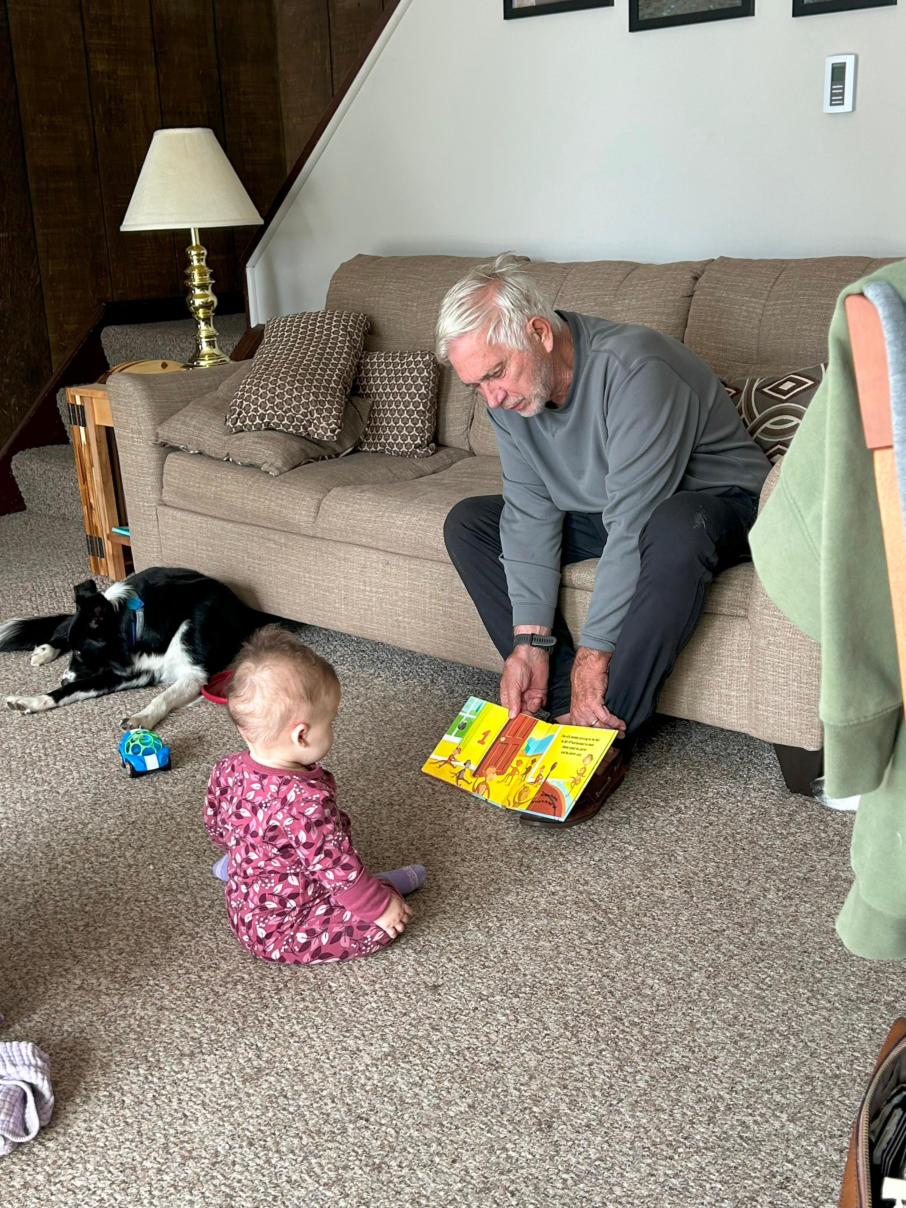 Grandpa, and grand-daughter in downstairs living room.