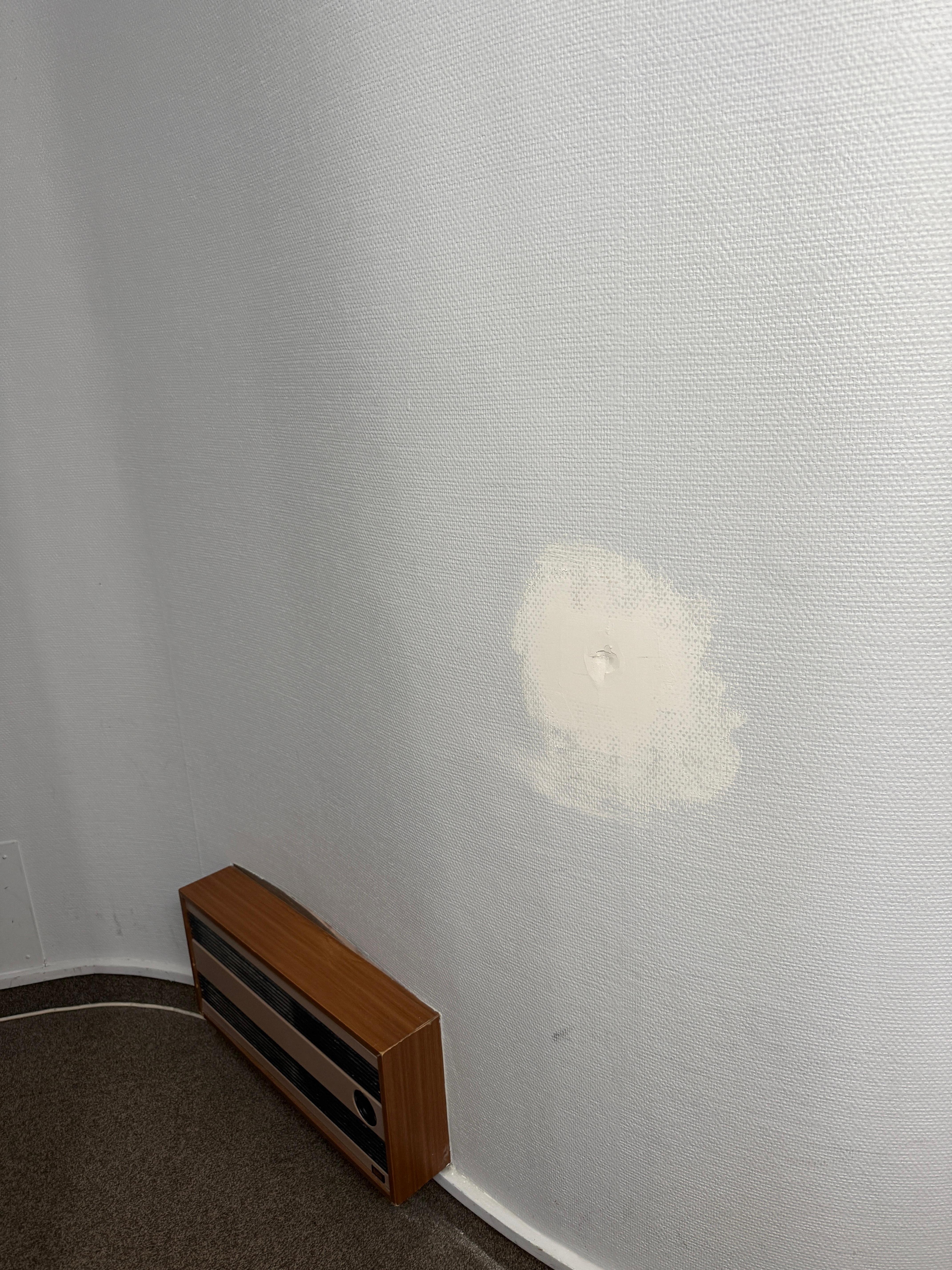 Patched, unpainted walls