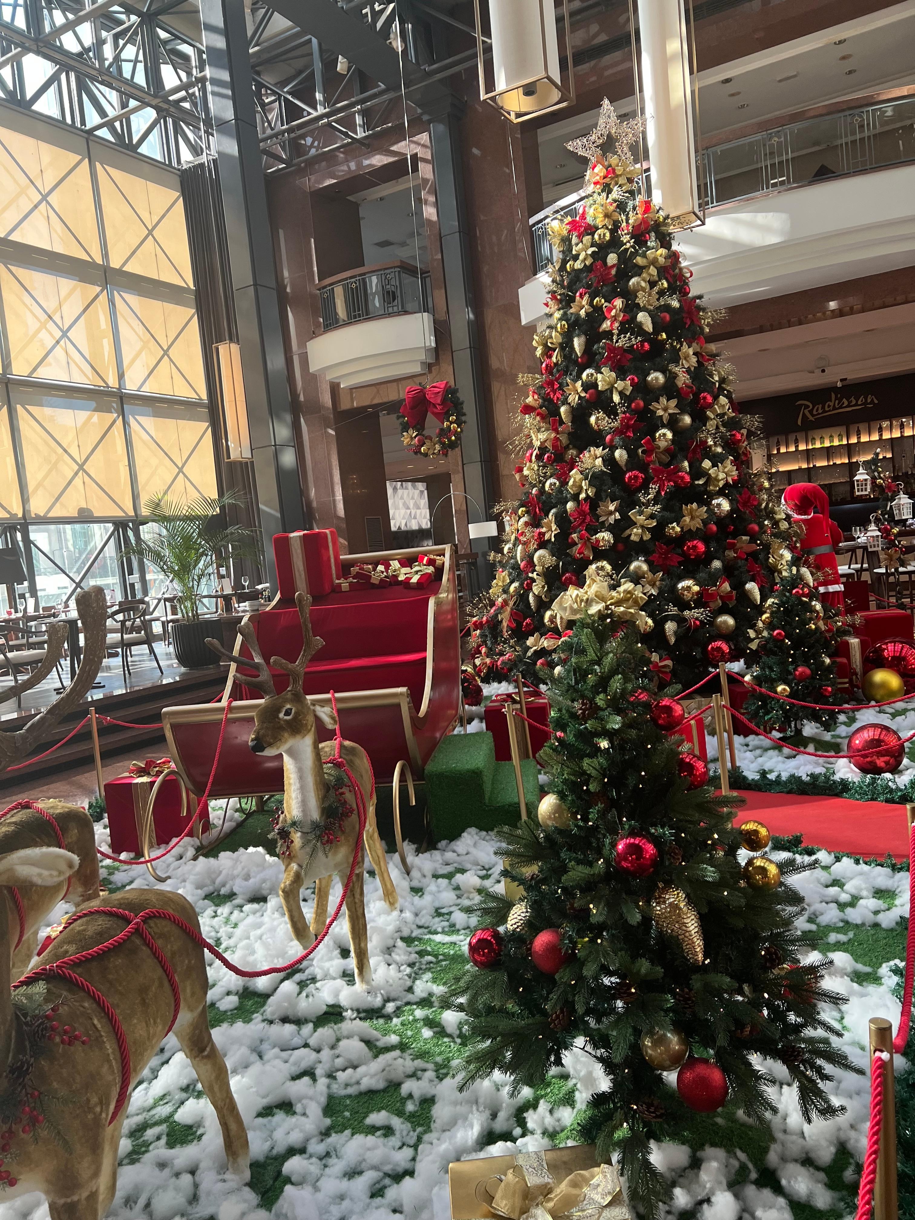 Lobby decorated for Christmas.