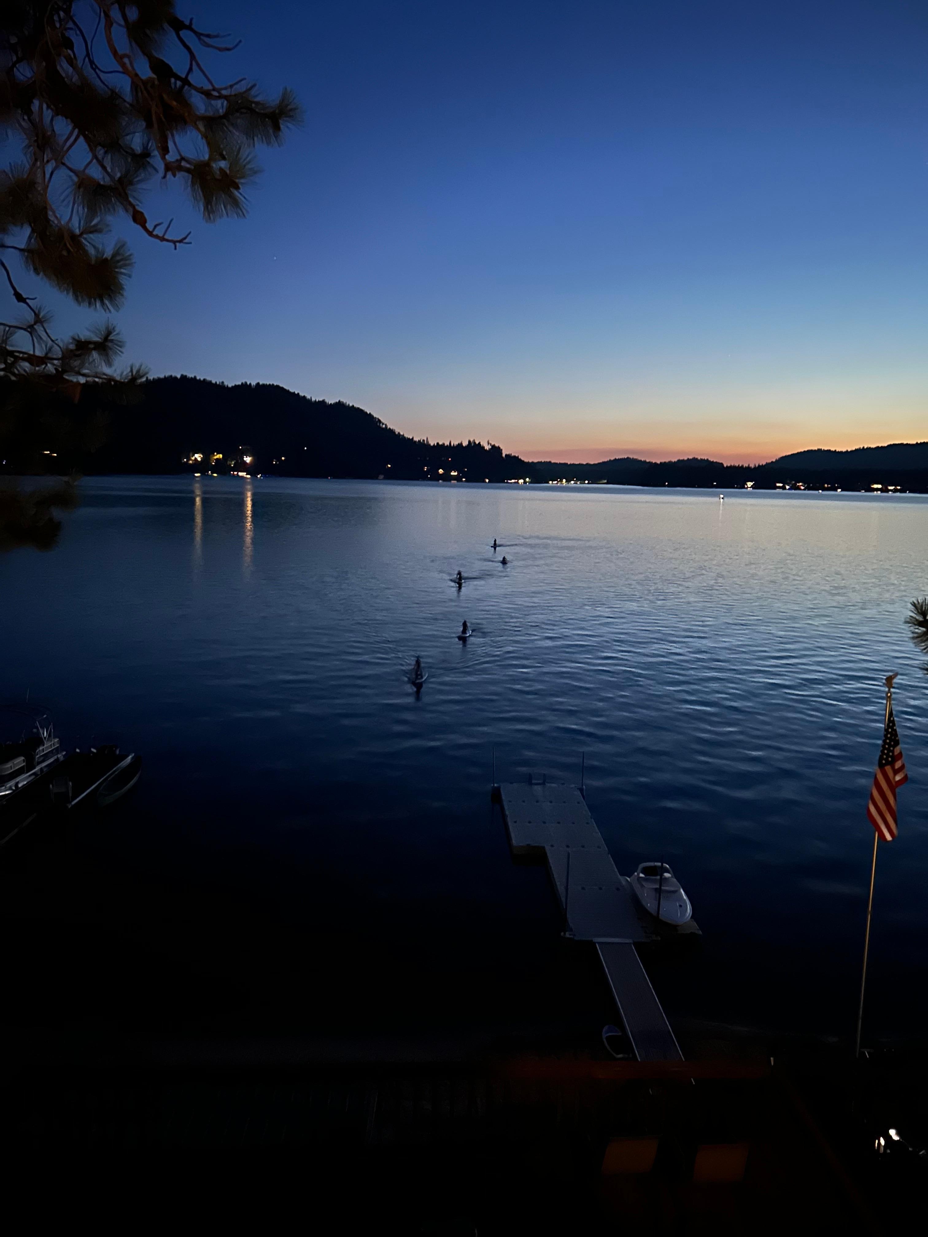 Kids coming in from a sunset paddle board outing 