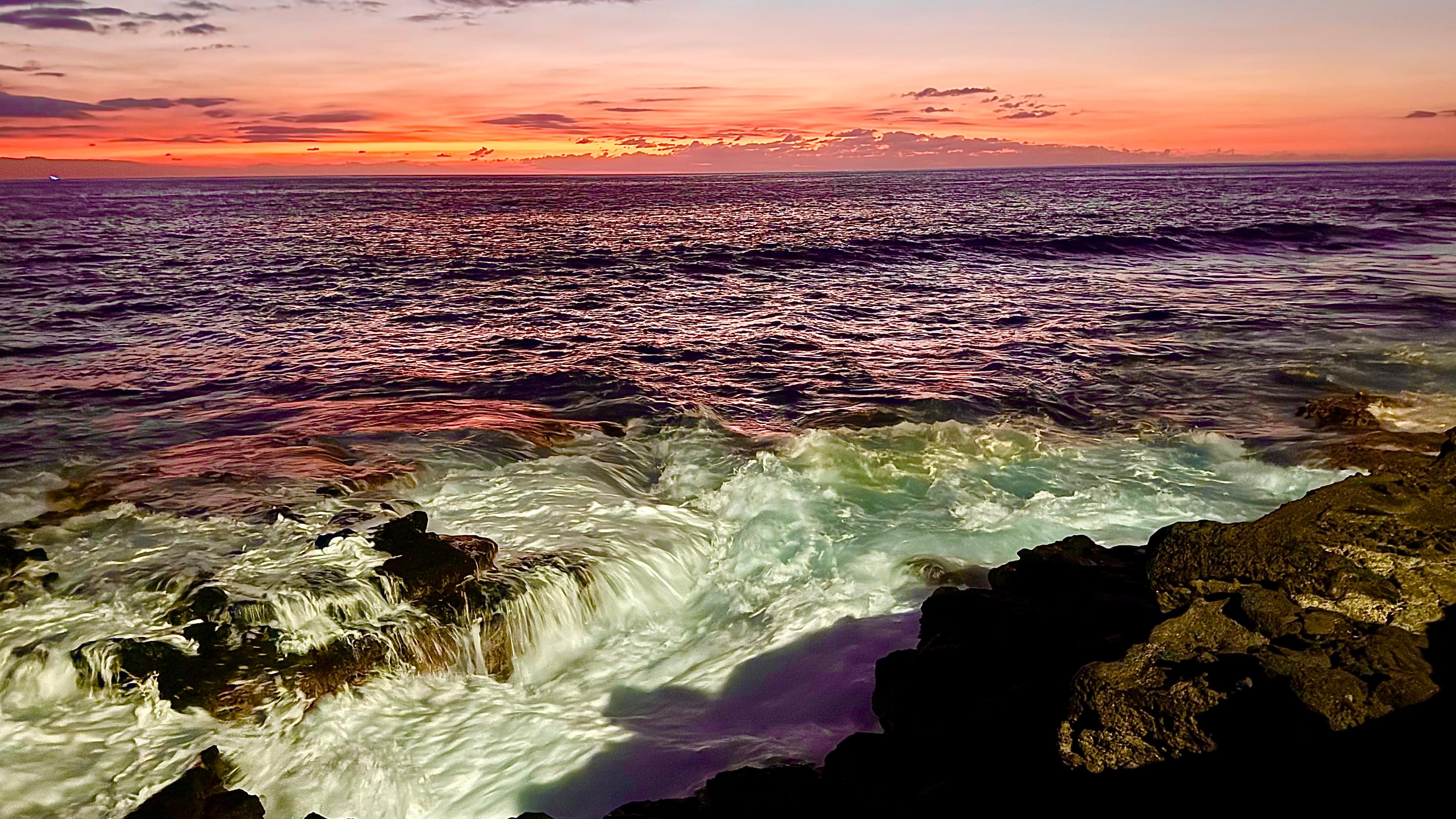 Sunset view from the sea wall in the picture above