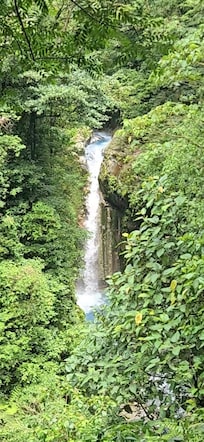 Ice blue colored waterfall